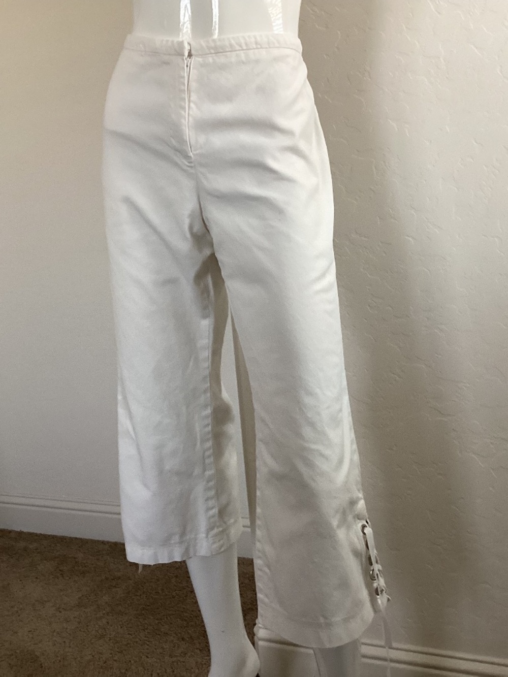 Express size 11/12, cream color denim cropped pants with ties at ankles